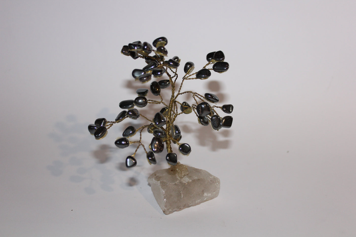 Tree - Hematite on Quartz base (gold) - med/lge