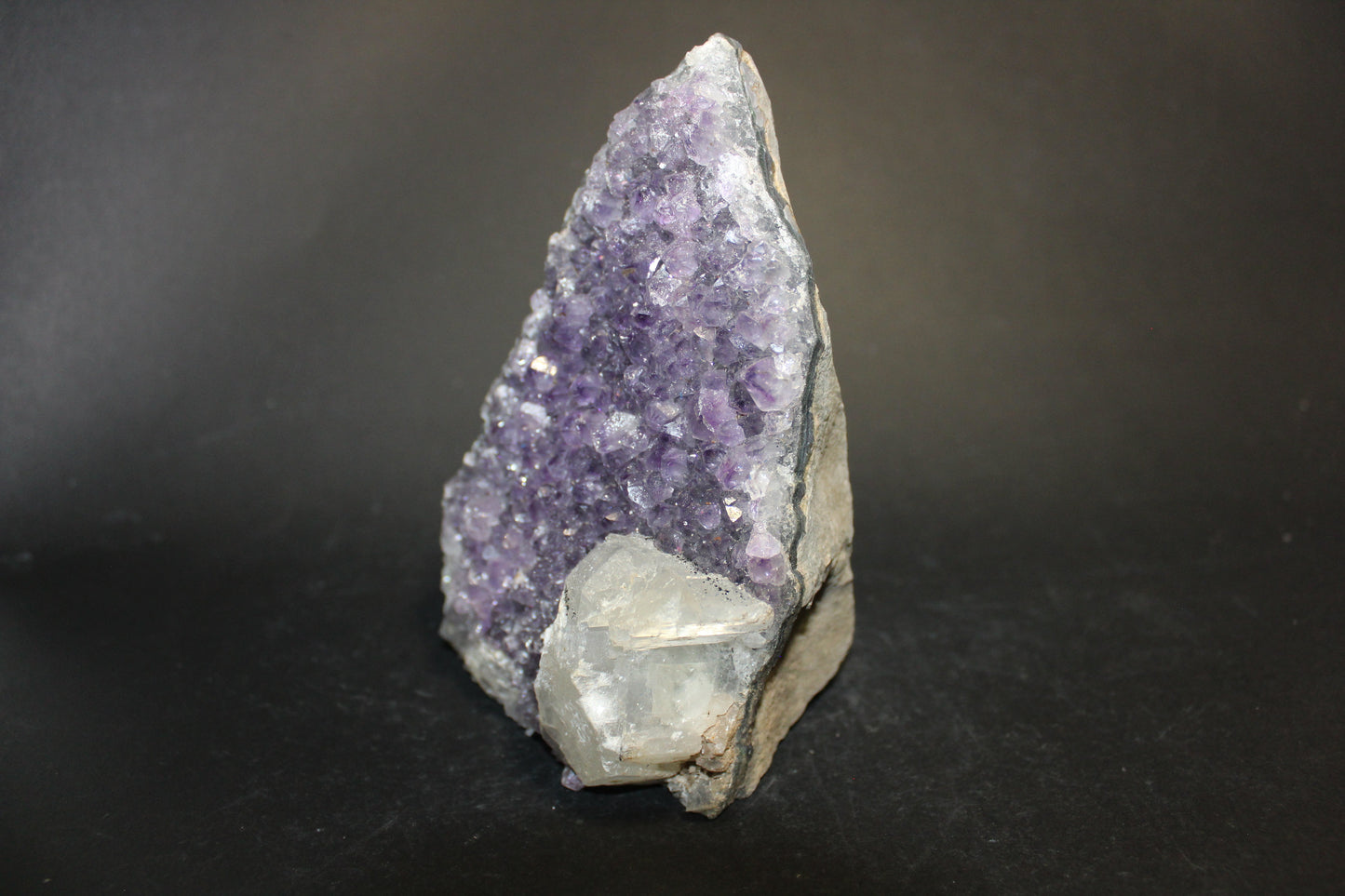 Cluster - Amethyst - stand (with Calcite inclusion) - med/lge