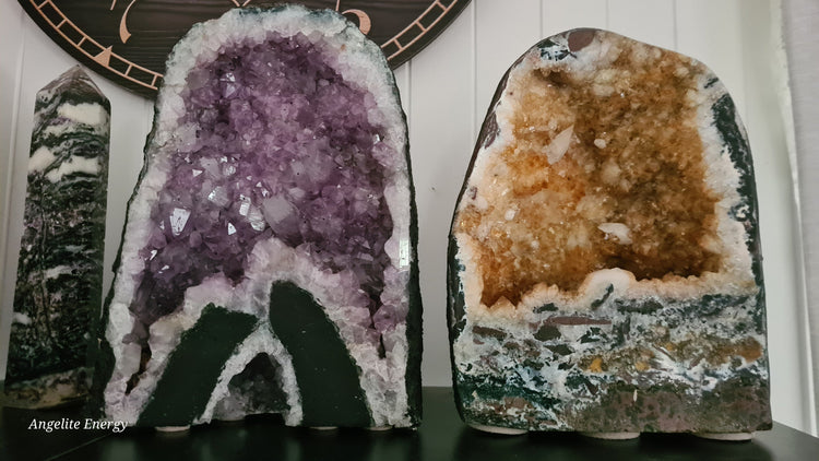 Amethyst and Citrine caves standing on shelves. Radiate peace and harmony and abundance