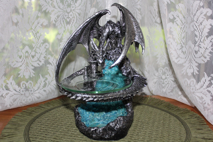 Silver dragon protecting mountain and crystal cave with glass bowl for oil burner. Holds tealight candle