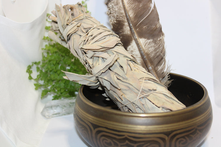 Sage smudge sticks in singing bowl presentation