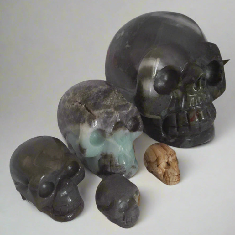 r crystal skulls in amazonite, picture jasper, labradorite and amazonite. Small med & lge