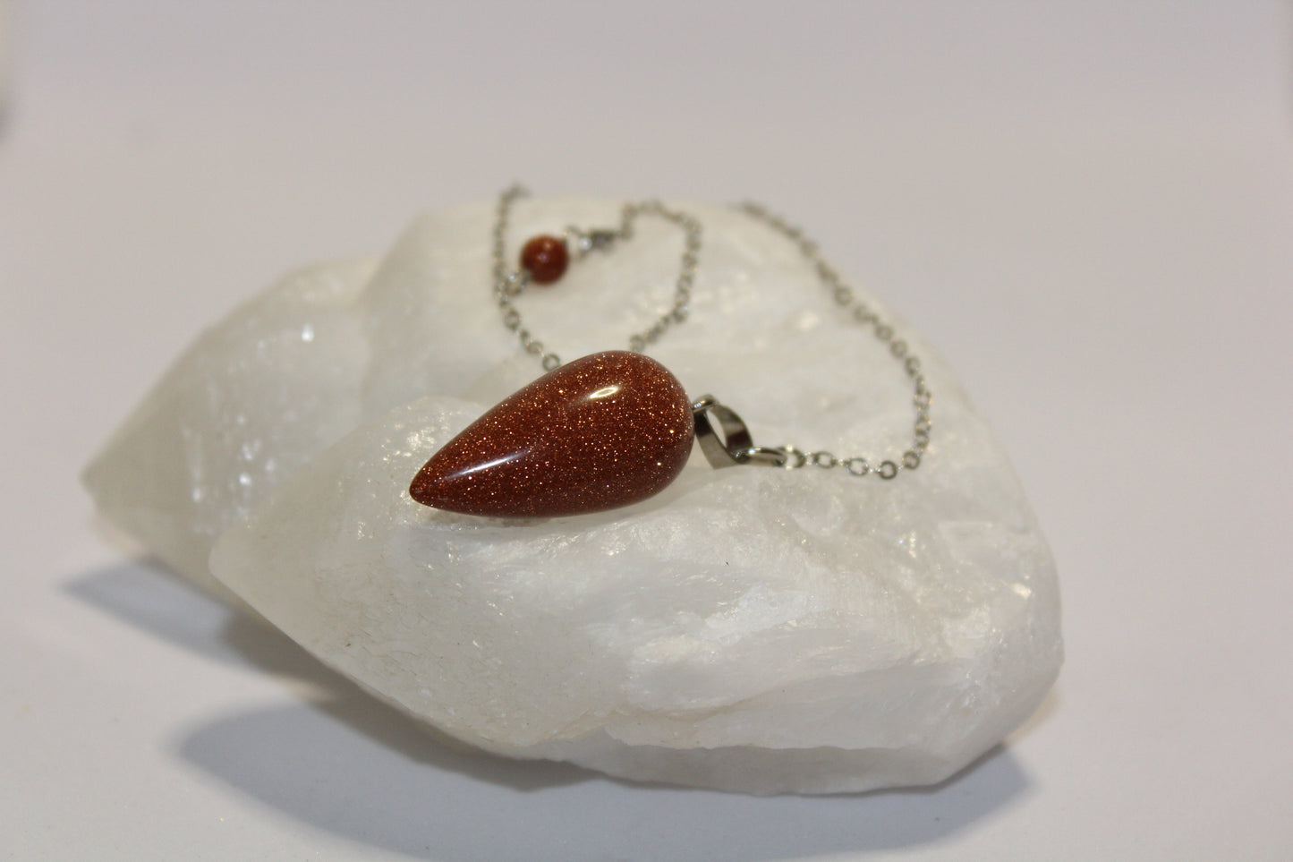 Pendulum - Red Goldstone