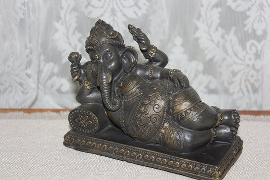 Ganesha - resting on cushion - bronze look