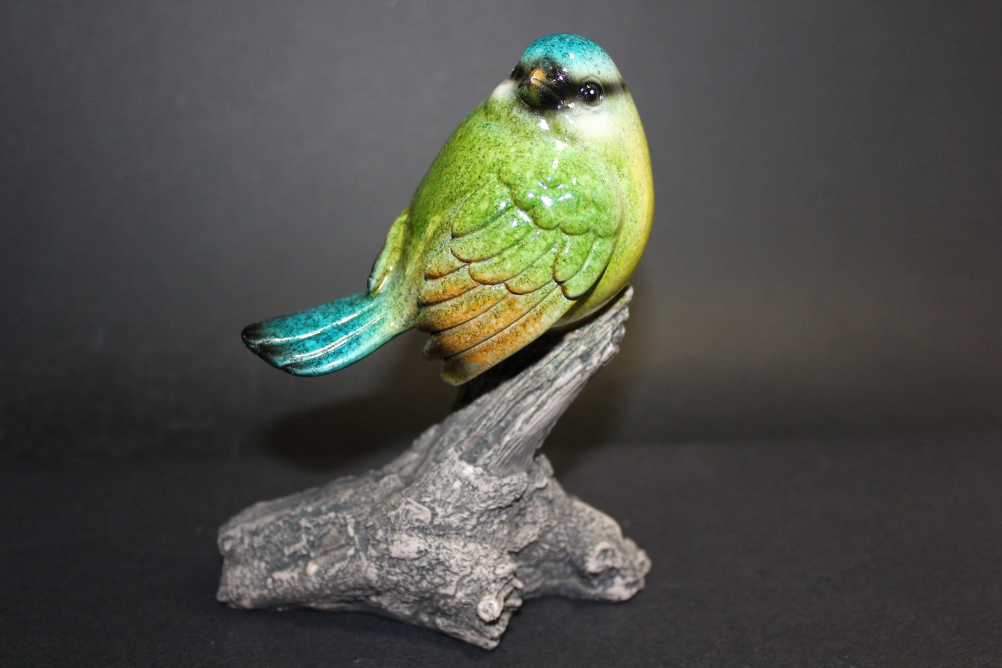 Bird - on branch (green/yellow/blue)